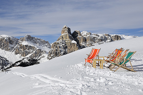 Deck chairs on the snow alta badia photo